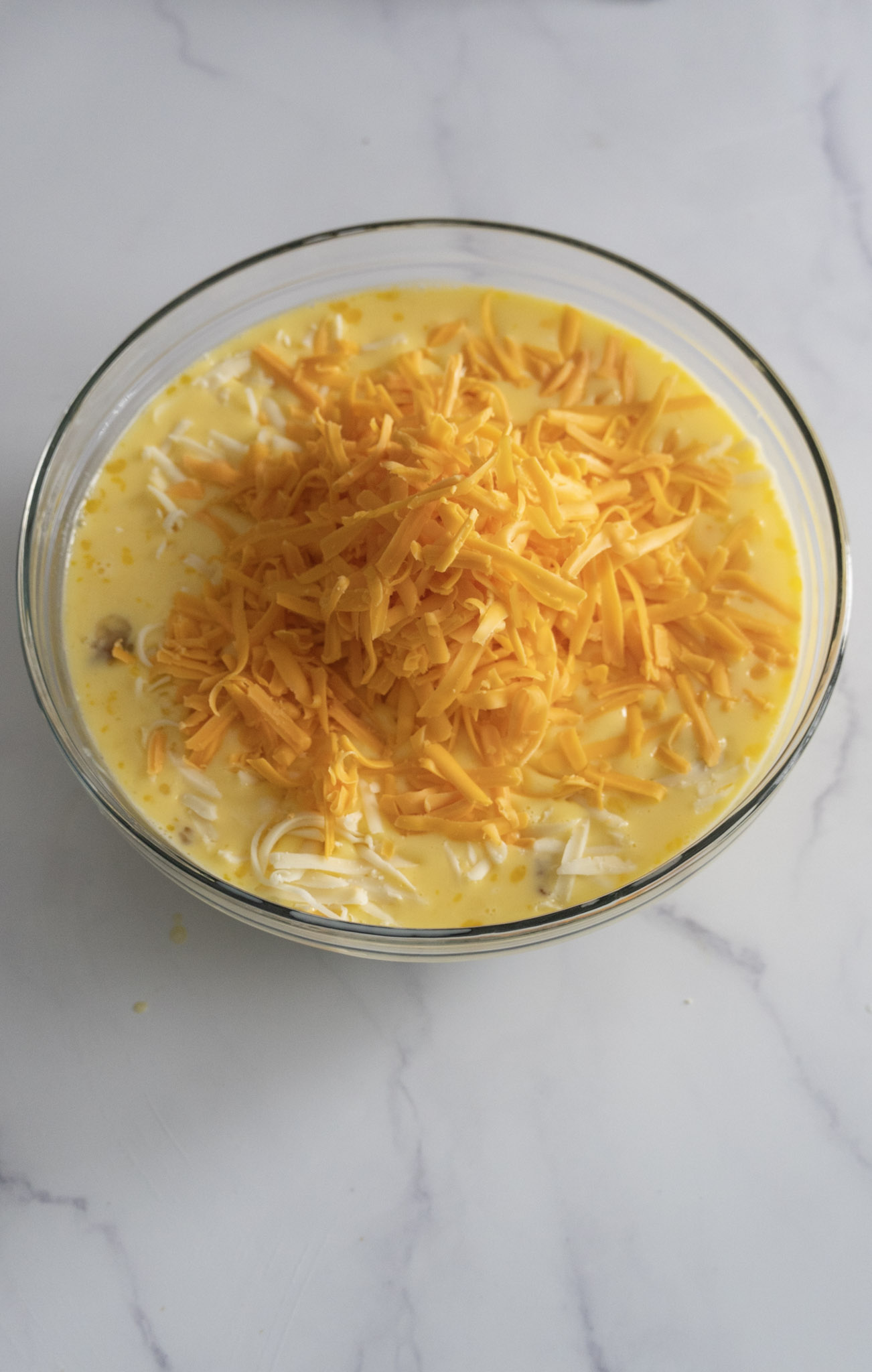 Mixture of Liquids With Cheese On Top
